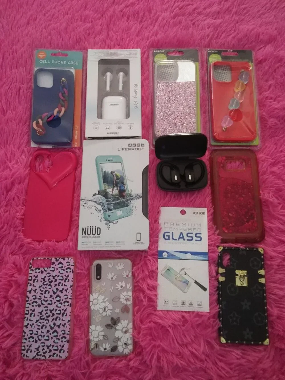 4 IPhone Cases , 2 Ear buds, 1 Screen Protector, 5 Android Cases Bundle